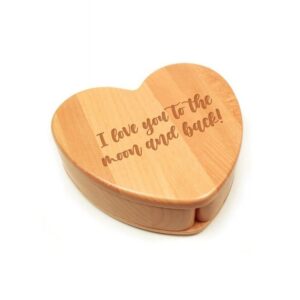 A wooden heart shaped keepsake box with engraving