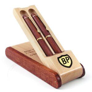 A maple wood pen box with engraved design