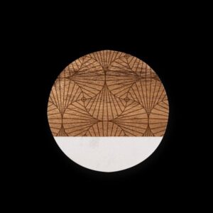 Round wood coasters with engraved design